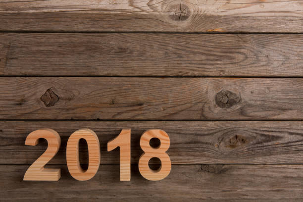 istock New Year 2018 with Wooden Numbers 891175528
