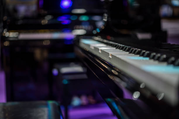 istock Piano keys on black classical grand piano 891181592