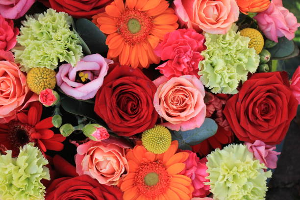 istock orange and red wedding flowers 891183830