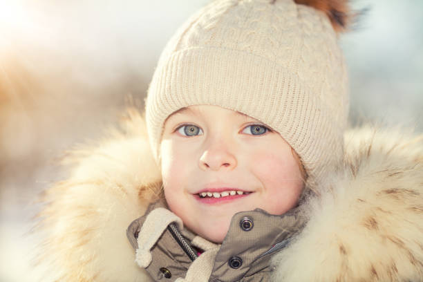 istock Little girl in a winter park 891184242