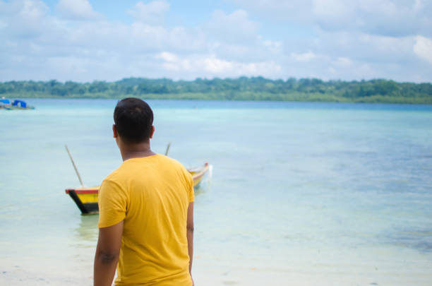 istock Man Standing and Looking at the Sea 891189688