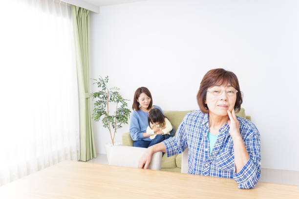 grandmother hates children making a noise - great grandchild imagens e fotografias de stock