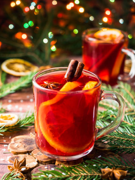 istock Christmas mulled wine with oranges and spices Christmas decorations with bokeh 891198042