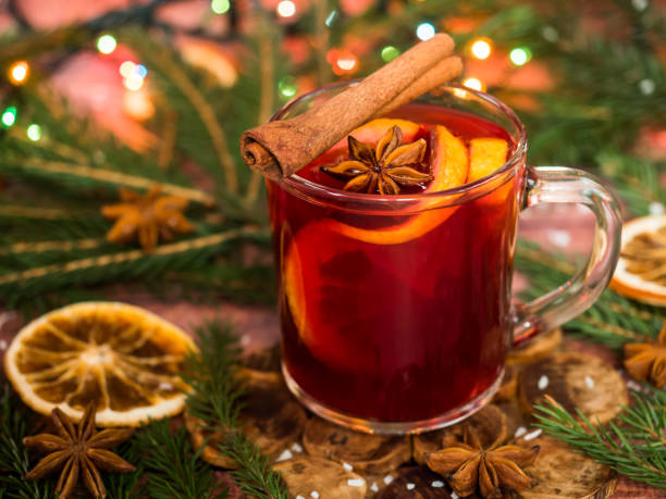 istock Christmas mulled wine with oranges and spices Christmas decorations with bokeh 891198332