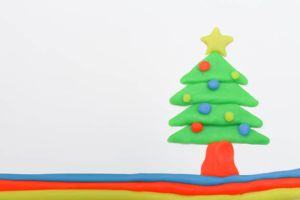 istock christmas tree play dough  close up image on white background. 891209602