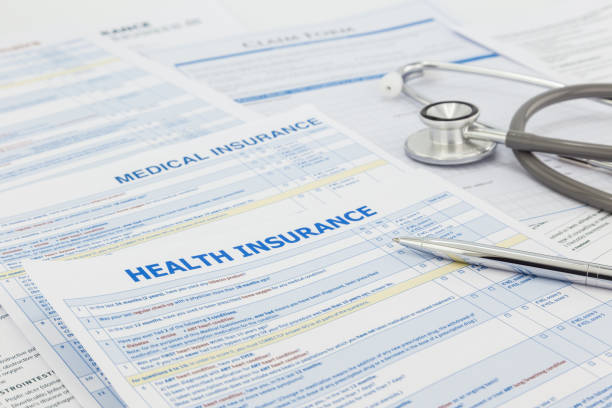 medical insurance application and legal contract - health insurance imagens e fotografias de stock