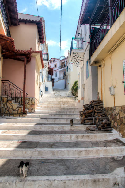 istock Typical street in Koroni, Greece 891253312
