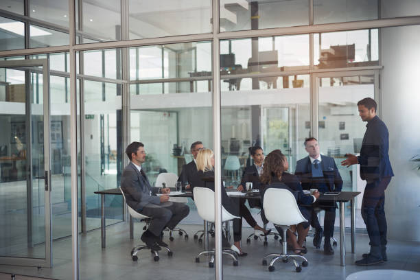 istock The whole team together for a meeting 891264740