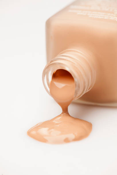 istock a glass bottle and a liquid base that is drawn from it 891297106