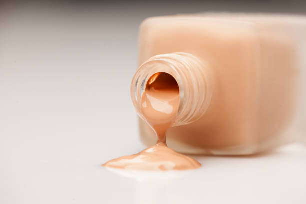 istock a glass bottle and a liquid base that is drawn from it 891297126