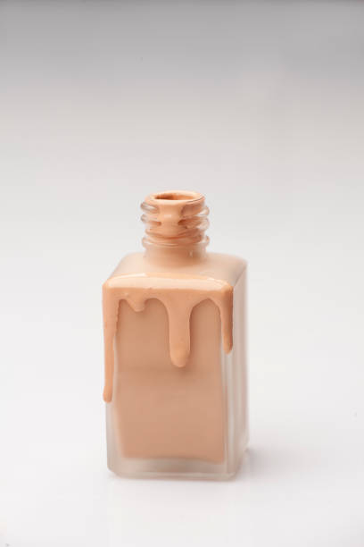 istock a glass bottle and a liquid base that is drawn on it 891297128