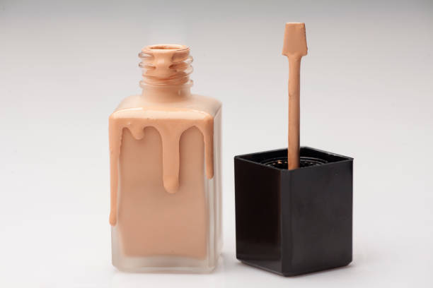 istock a glass bottle and a liquid base that is drawn on it 891297144