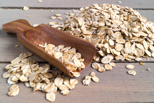 istock Oatmeal cereal with a spoon for bulk products. 891303470