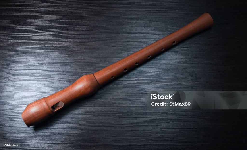 musical instrument wooden flute in the background Acoustic Music Stock Photo