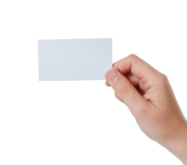 istock Raised right hand holds up blank business card 891310288