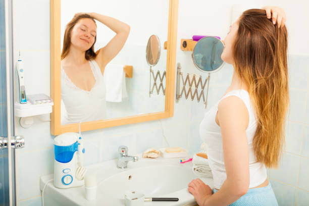 istock Woman without makeup relaxing in bathroom. 891310380