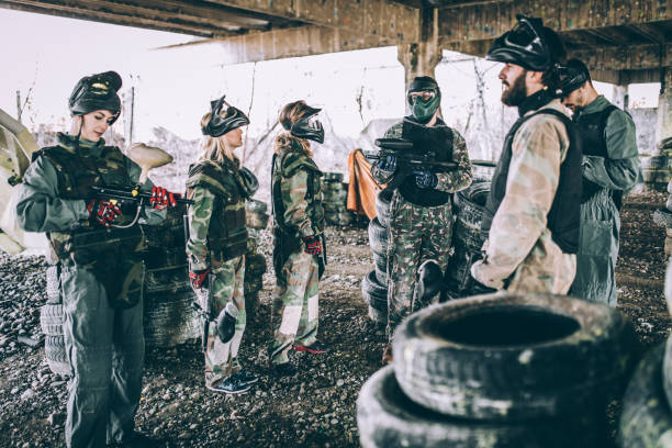 istock Team of paintball players 891315644