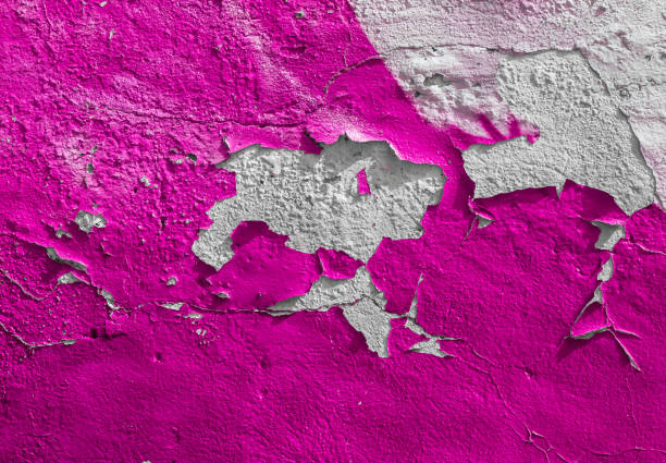 istock Old pink wall with the peeled-off paint 891318334