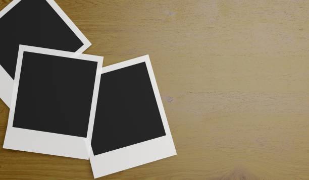istock Photo Frames On Wooden Background 891318418