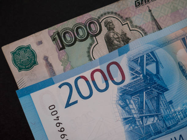 istock New russian 2000 rubles and old 1000 rubles detail view. 891318648