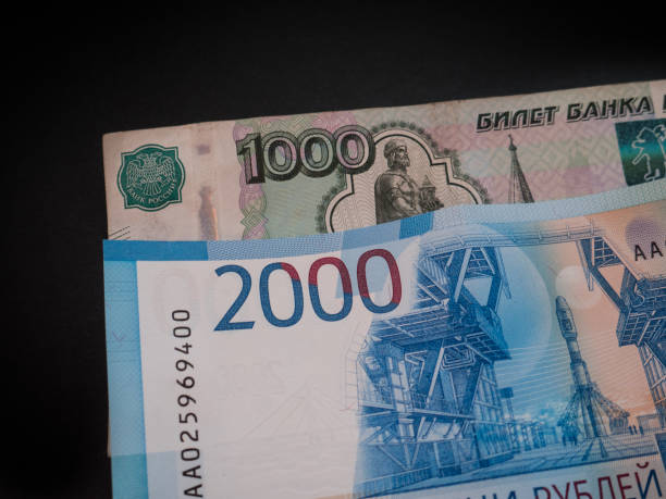 istock New russian 2000 rubles and old 1000 rubles detail view. 891319236