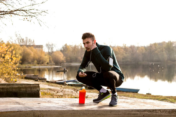Exhausted runner resting after run