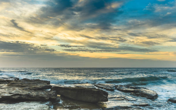 istock Early Morning Seascape with Clouds 891329862