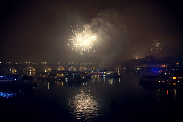 istock Fireworks on New Year's Eve over ships on the Vltava River in Prague 891329880