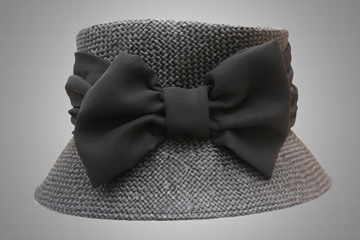 Black woman hat with a bow tie