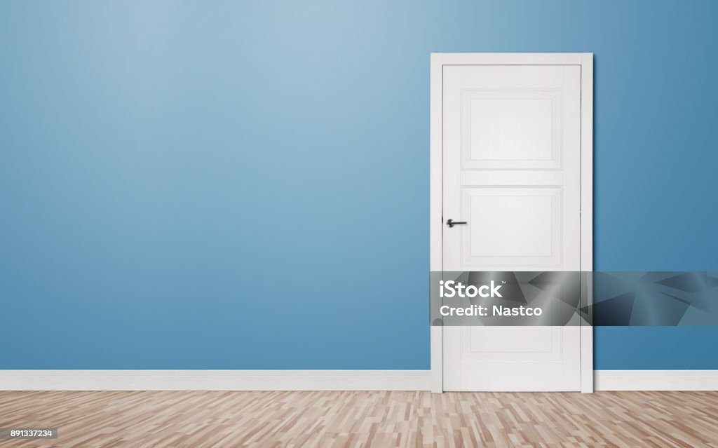 Closed door in the empty room Close up of closed wooden door in the empty room with copy space Door Stock Photo