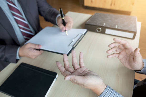 istock Job interview, Young attractive executives man asking questions to applicant about work history, colloquy dream,  Skill, expertise, experience and businessman listen to candidate answers 891341378