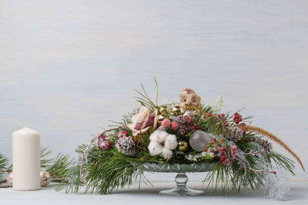 istock Decorative Christmas bouquet with candles 891345018