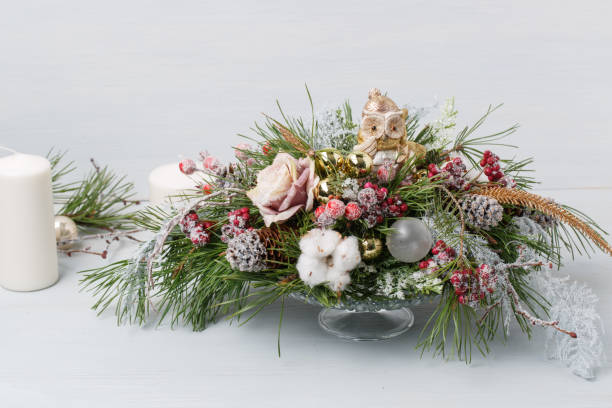 istock Decorative Christmas bouquet with candles 891345046