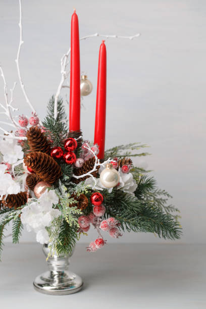 istock Decorative Christmas bouquet with red candles 891345086