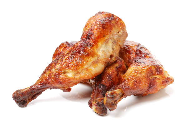 istock Roasted duck legs on the white background 891347982