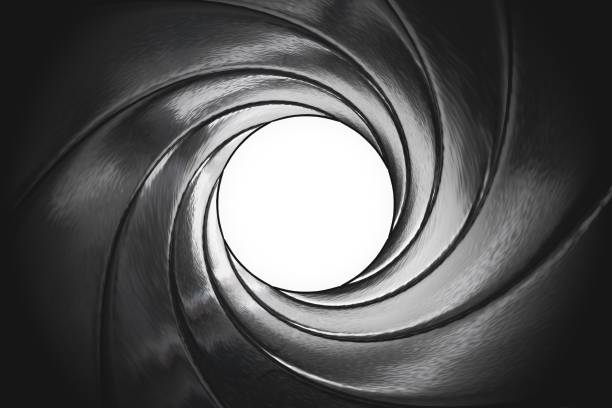 istock View through twisted gun barrel. 3D rendered illustration. 891348718