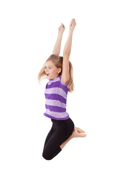 istock young girl jumping 891351700