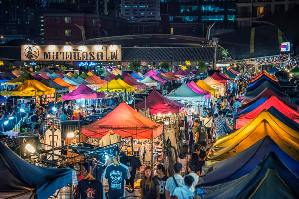 Train night market in Bangkok 8 March 2017, Colorful new Rod Fai market in Ratchadapisek in Bangkok night market stock pictures, royalty-free photos & images