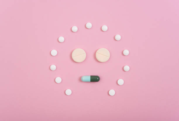 istock colorful medicine. Pharmacy on pink background. 891352264