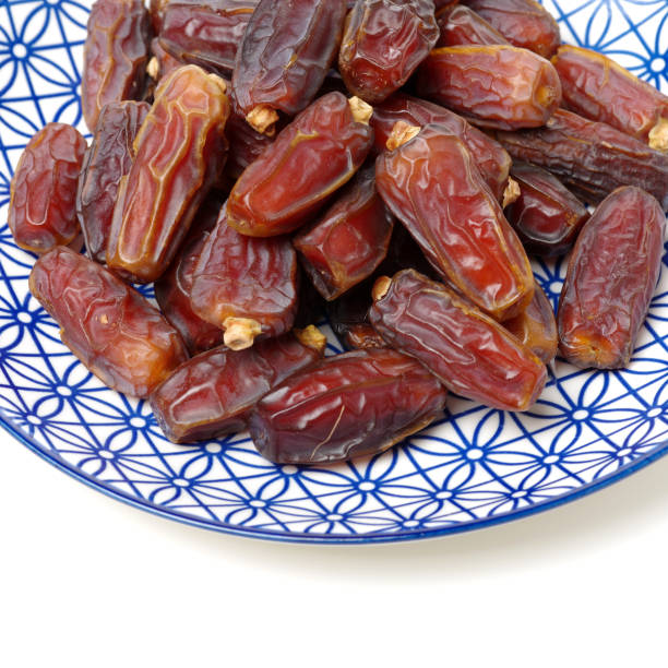 istock Fried red on a white background red dates  isolated on a white background 891353698