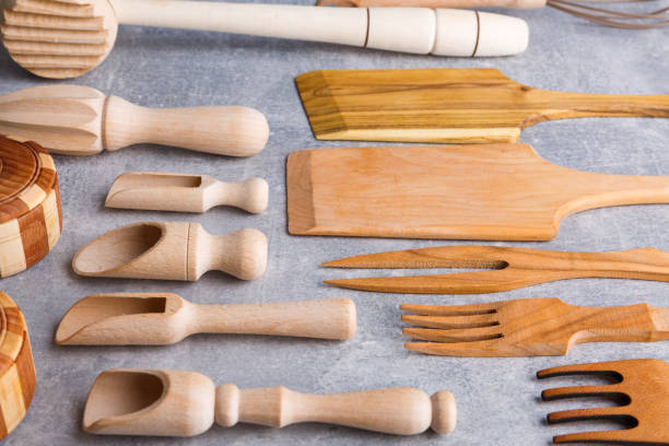 istock A top view on wooden cutlery on the light marble background. 891357104