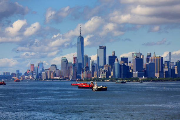 istock Freighters in Harbor with New York City in Background 891368236