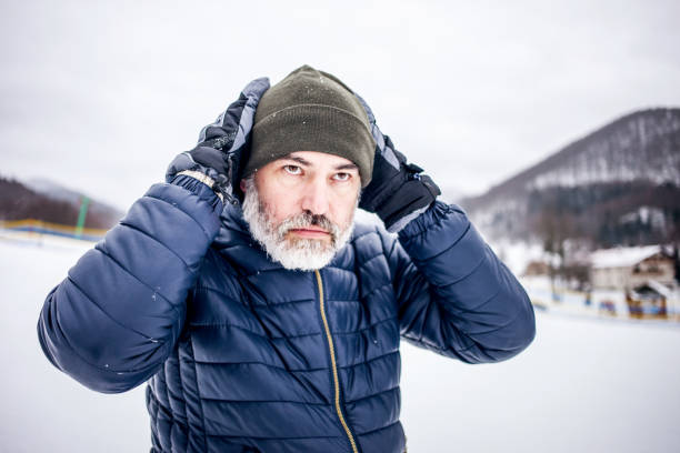 istock Mature man Portrait on a cold Winter day 891373704