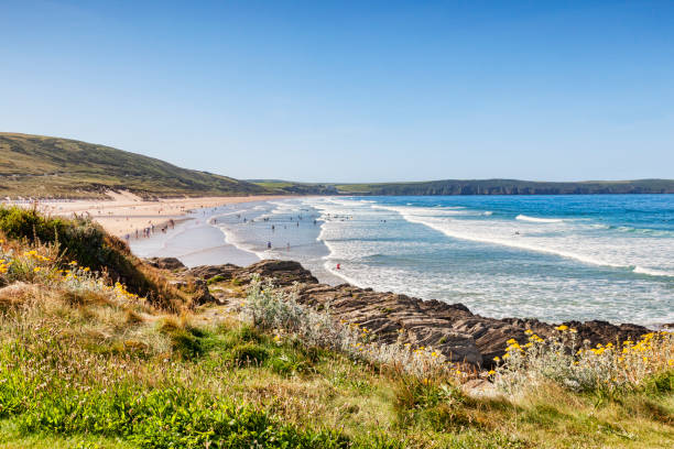 Woolacombe North Devon UK The beach at Woolacombe, North Devon, England, UK, on one of the hottest days of the year. devon stock pictures, royalty-free photos & images