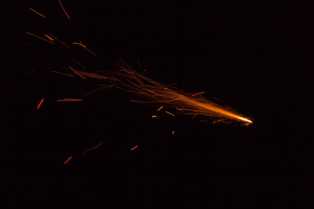 istock Burning fuse with sparks on black background 891380460