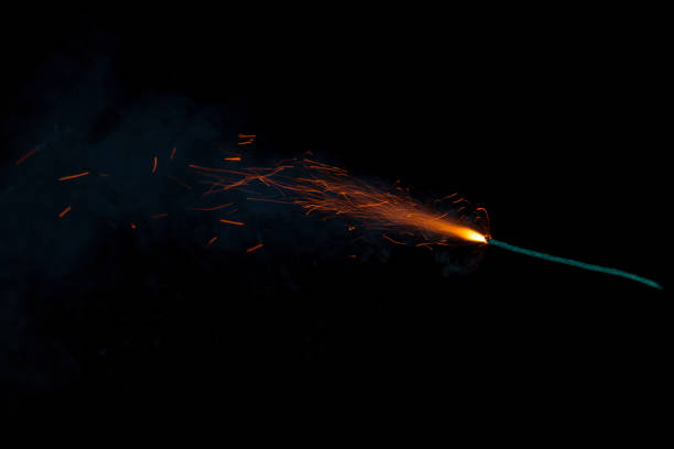 istock Burning fuse with sparks isolated on black background 891381066