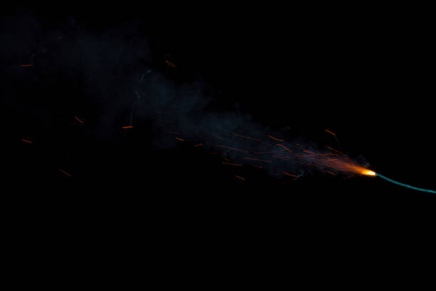 istock Burning fuse with sparks isolated on black background 891381134