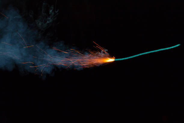 istock Burning fuse with sparks on black background 891381194