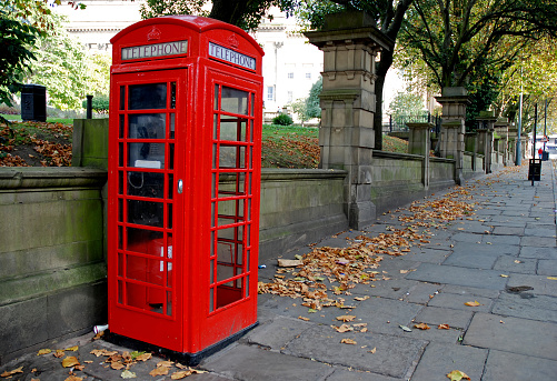 Traditional old style UK red phone box