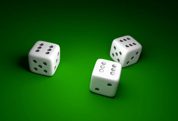 istock Three dice with number six on green casino background 891391398